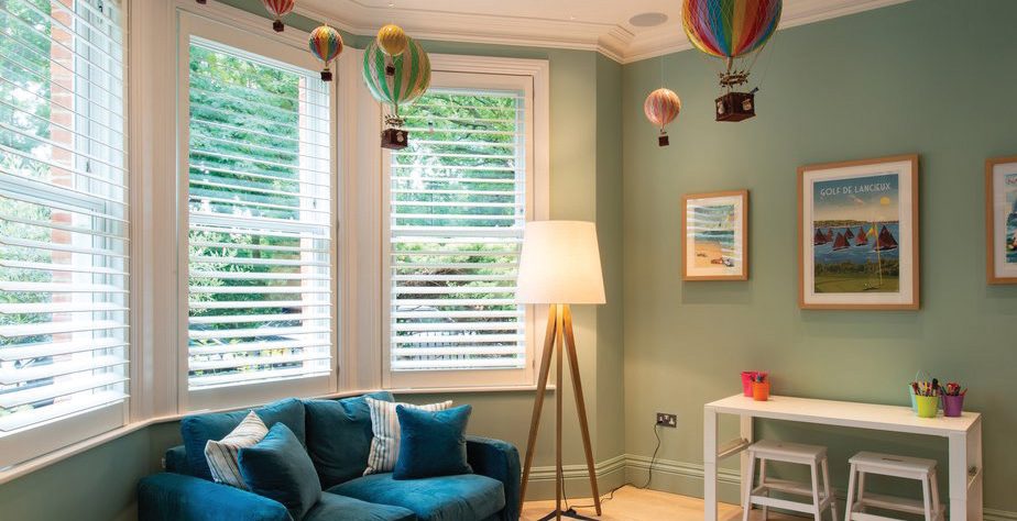 Café style shutters on a bright bay window