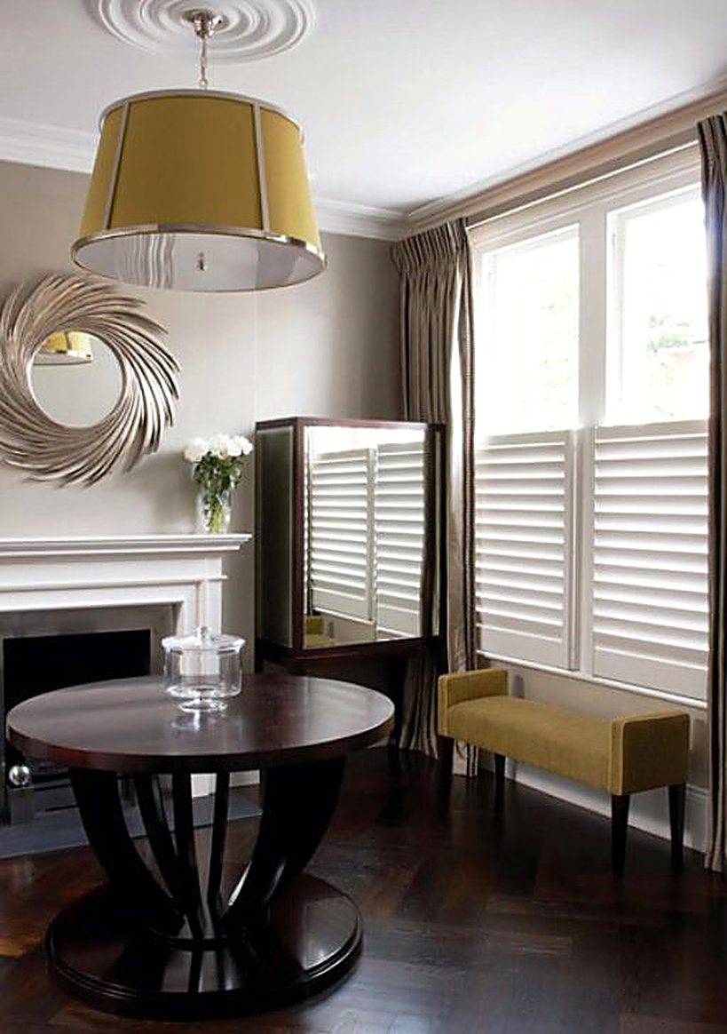 Café style shutters in a refined sitting room