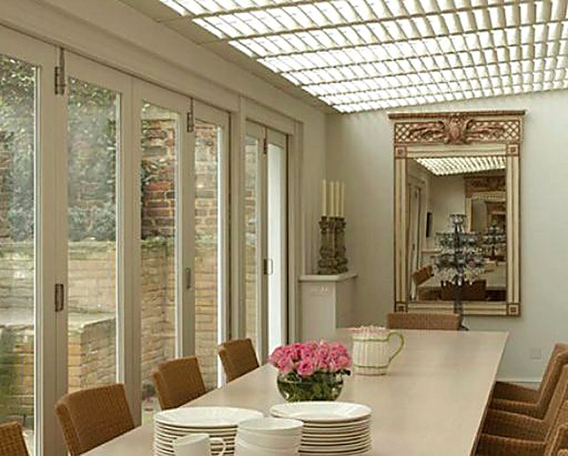 Roof lantern dressed with low-profile Kandas roof shutters