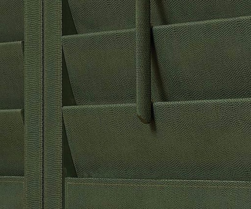 Deep green hand-covered suede shutter close-up